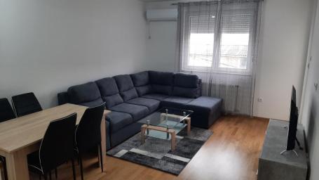 Nov Dvosoban namešten stan + garažno mesto blizu Centra