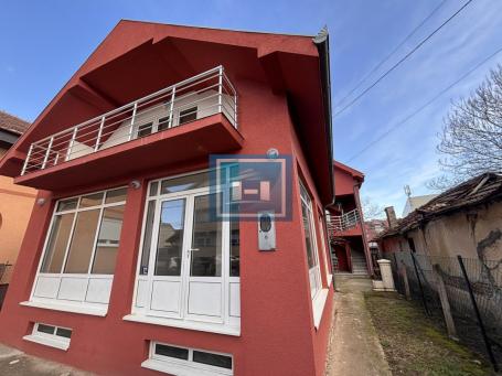 Larger office space and a new house in one place in the city center