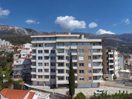 Na prodaju nov, nenamješten stan površine 59 m² u Bečićima
