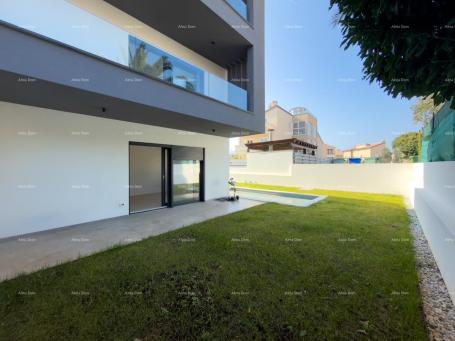 Wohnung PREMANTURA - Wohnung mit Garten und Pool, 500 m zum Meer (101)