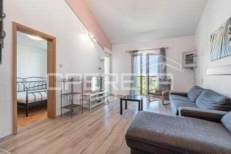 UMAG – PROSTRAN STAN 87,19 m² S POGLEDOM NA MORE, 200 m OD MORA I PLAŽE